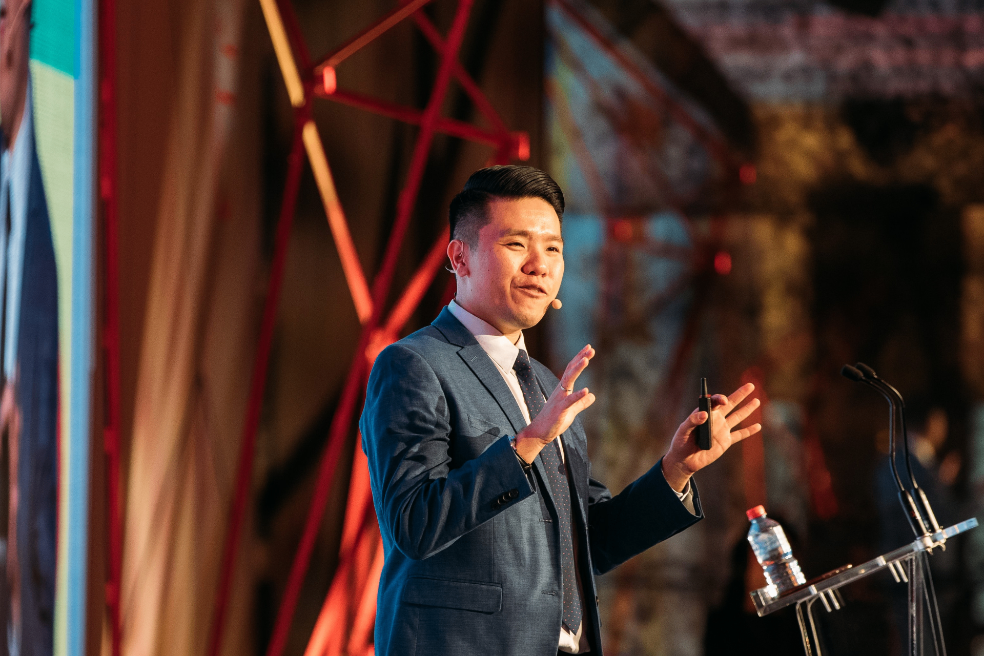 Benjamin Loh speaking on stage